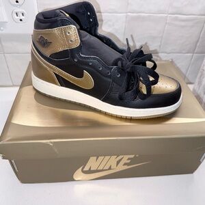 Nike Black and Gold Sneakers